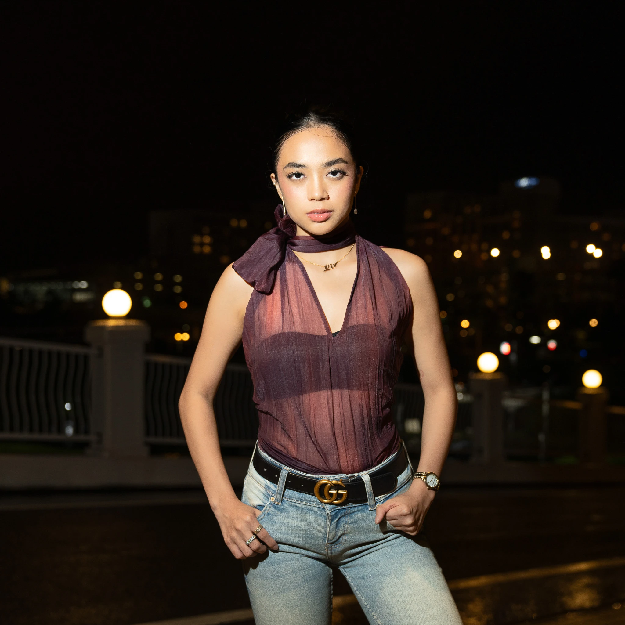 Directly lit portrait with a dark night-time background