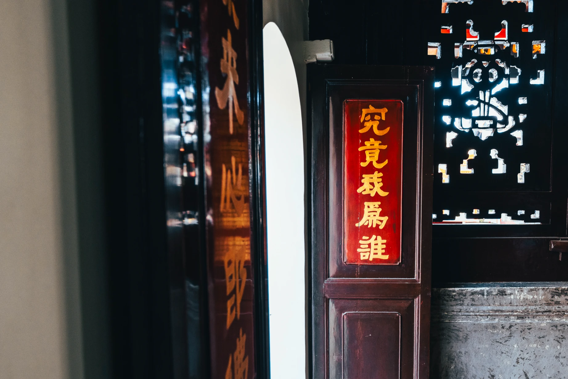 Sacred architecture and historic streets along Harmony Street in Melaka.