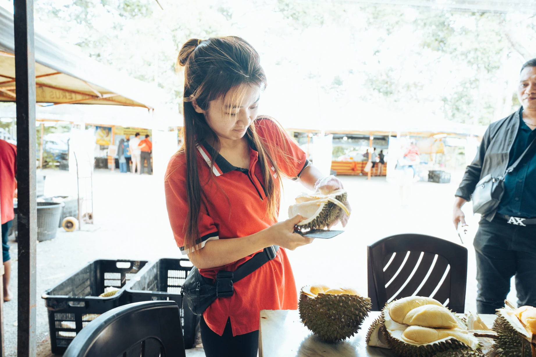 Fresh durian and local customers at Durian Heng in Melaka.