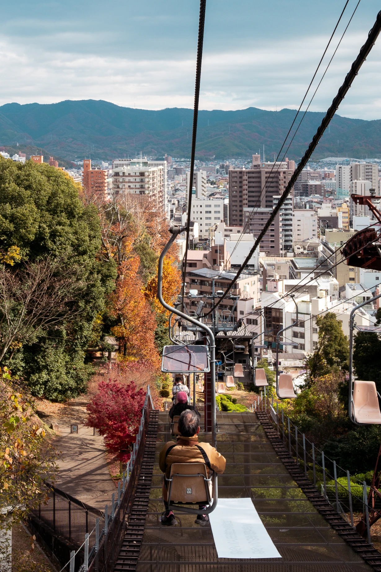 Stone walls and historic architecture at Matsuyama Castle above the city.