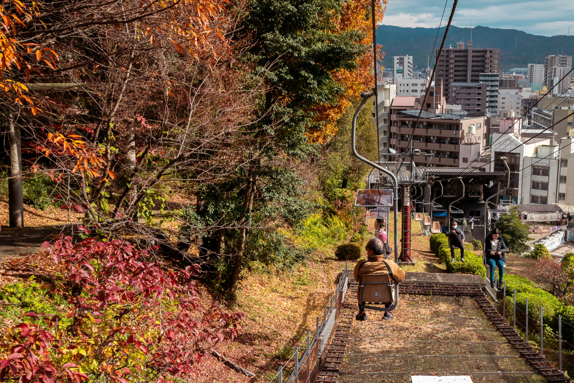 Stone walls and historic architecture at Matsuyama Castle above the city.