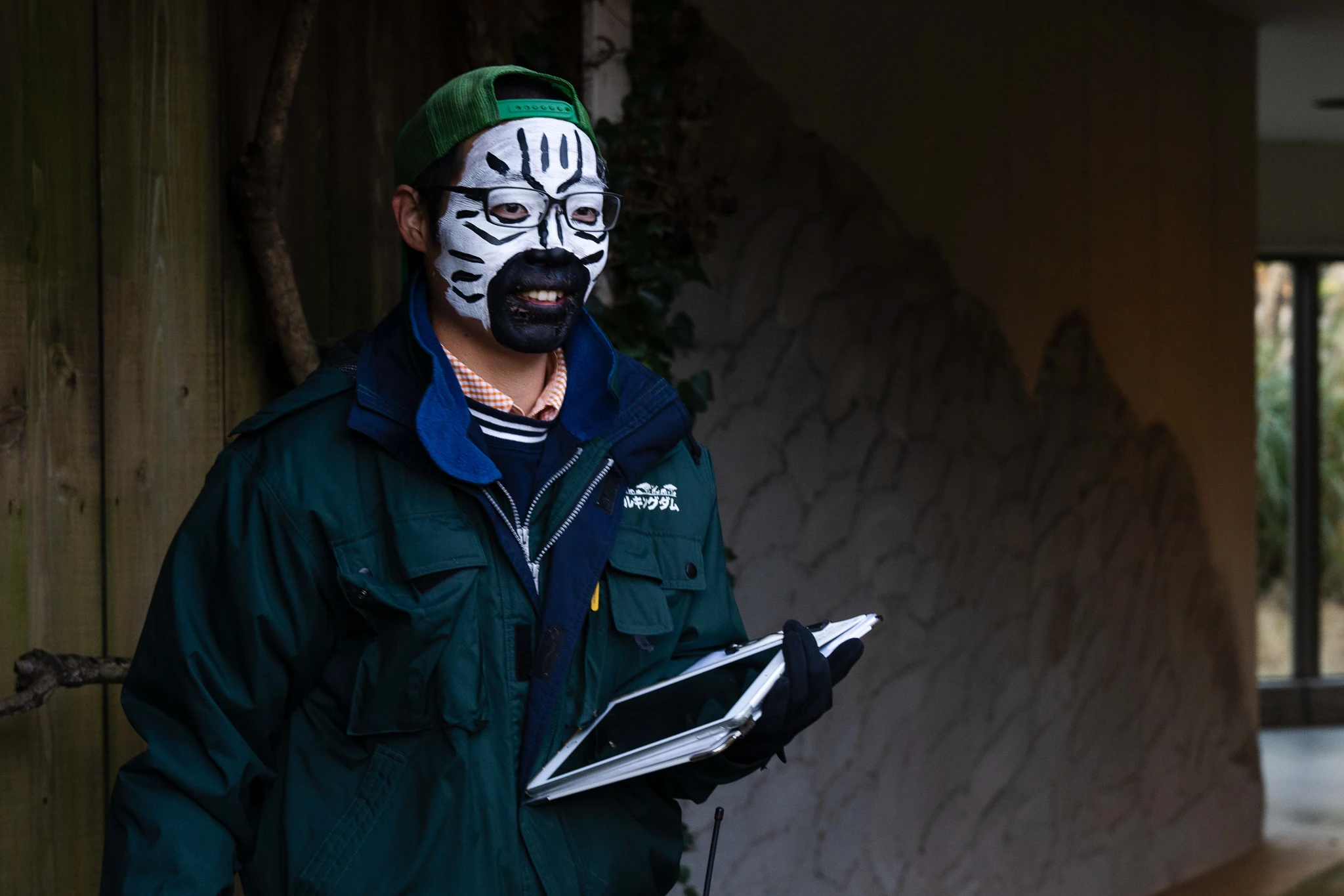 Guide wearing an animal-patterned face covering
