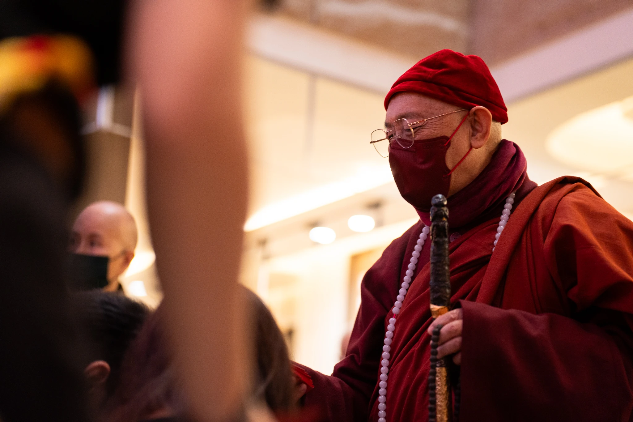 Venerable Hsin Tao lighting the ceremonial lamps before Ling Jiou Mountain's 2026 Lunar New Year celebration.