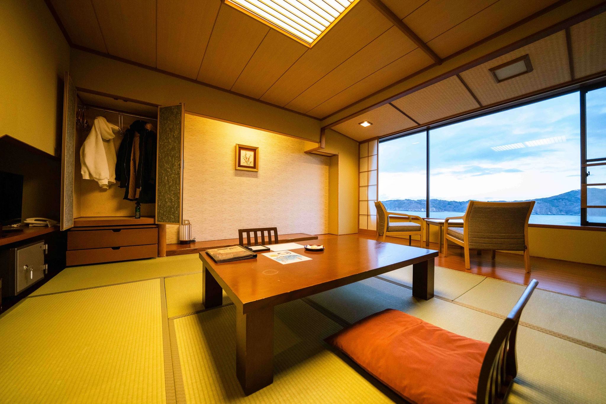 Tatami room with a low table and bay-facing windows