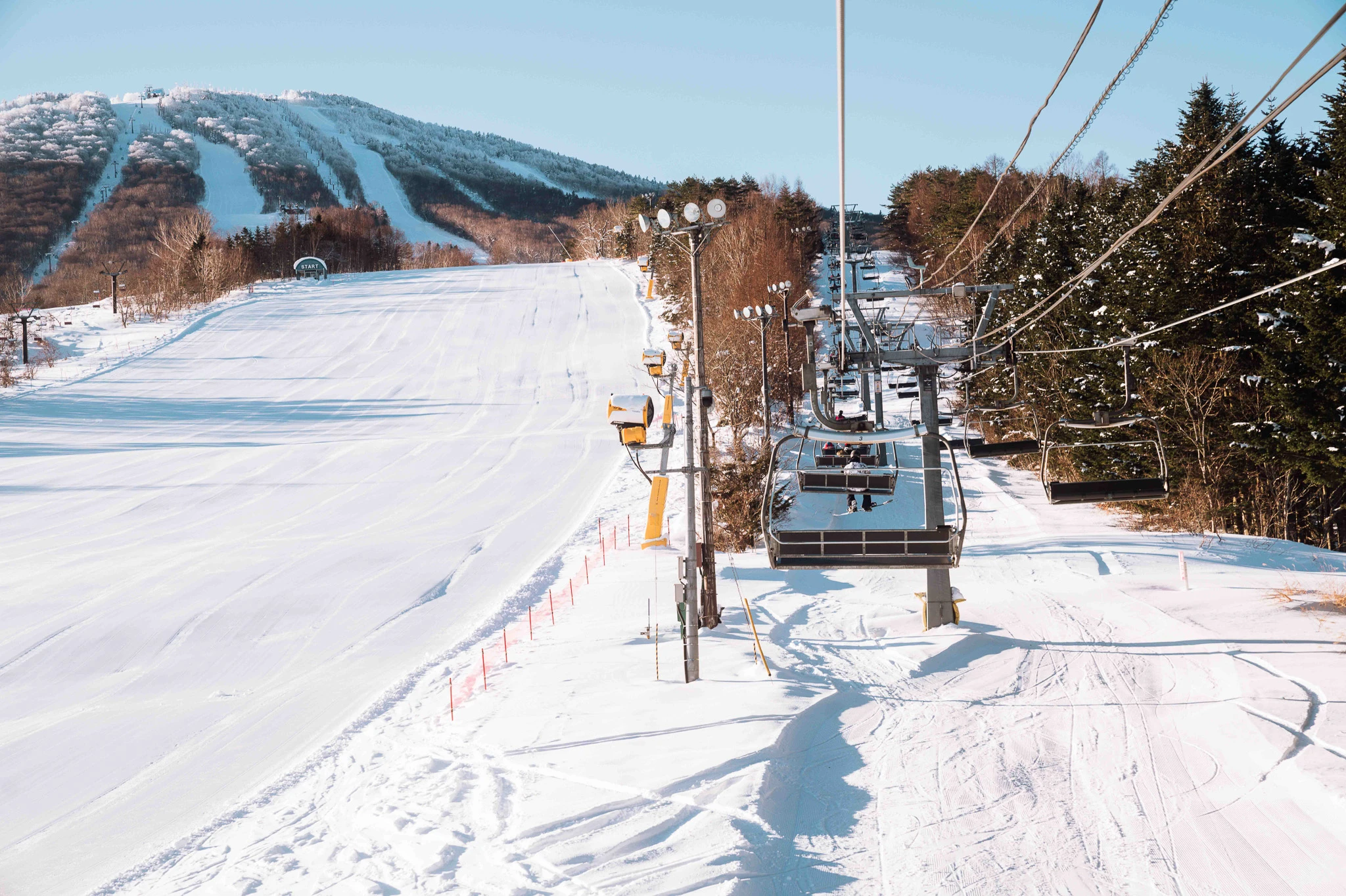 Ski lift and tracks across the snow