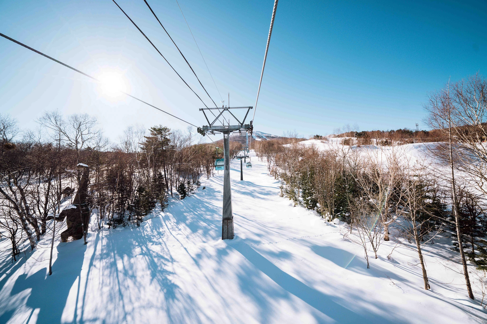 Lift route over a snow-covered clearing