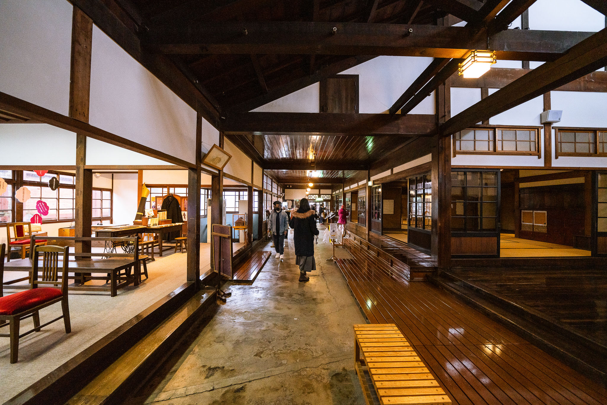 Wide interior view through connected rooms at Shayokan