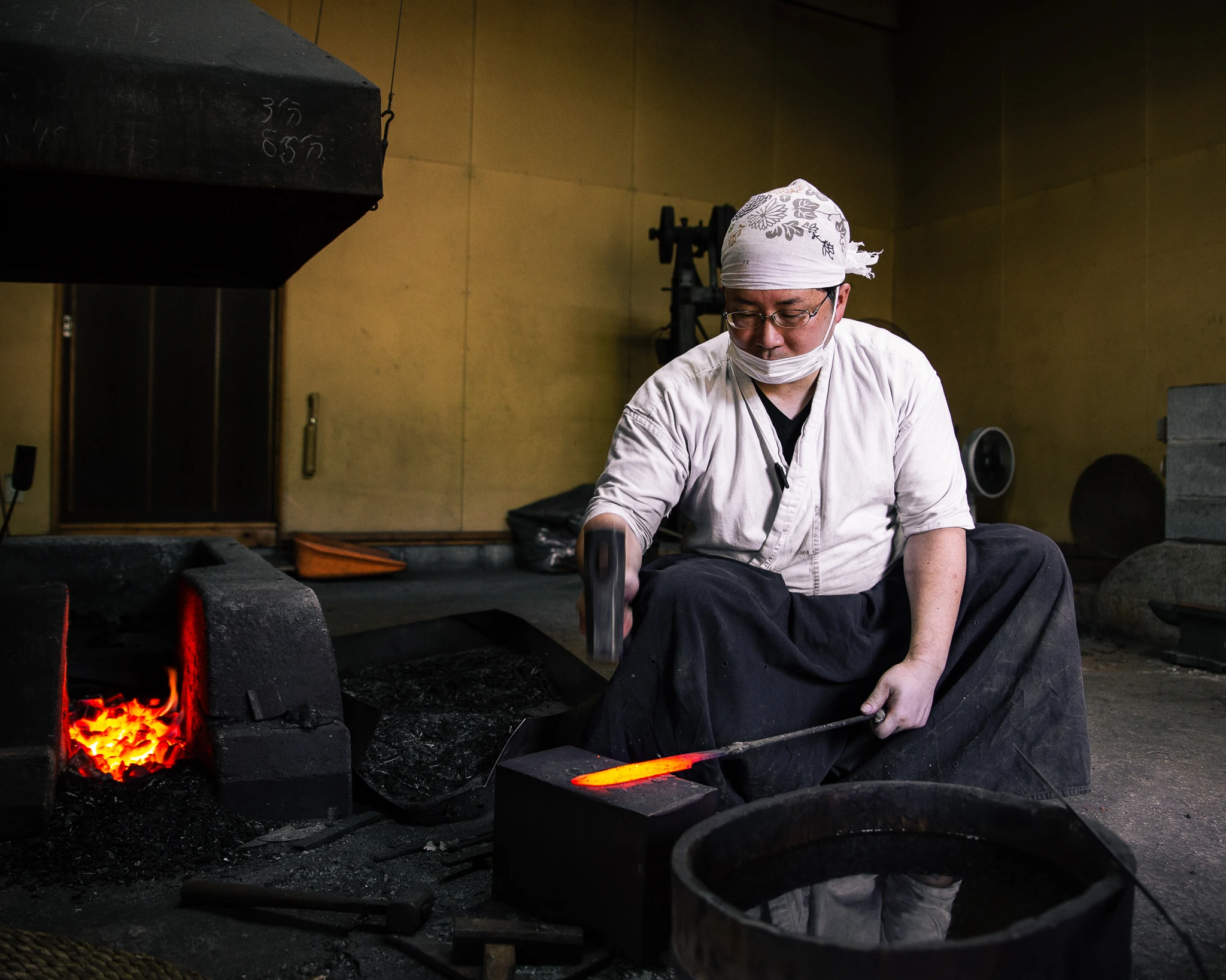 Kyoto Masahiro Bladesmith forging a handcrafted knife inside traditional workshop