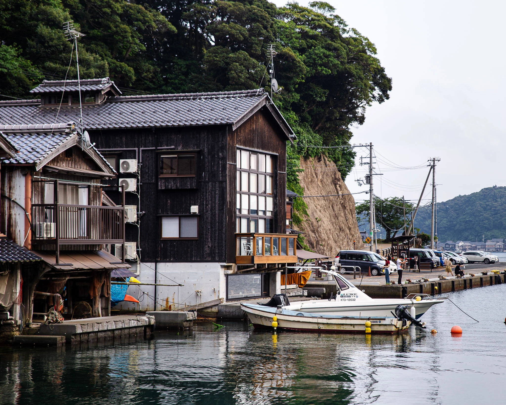 Boathouse corner beside a small moored boat