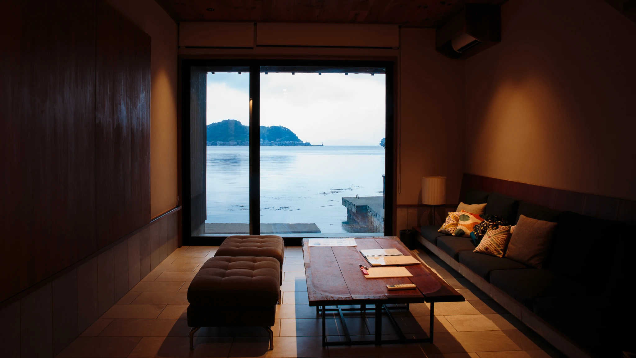 Sea-facing lounge with a low table and seating